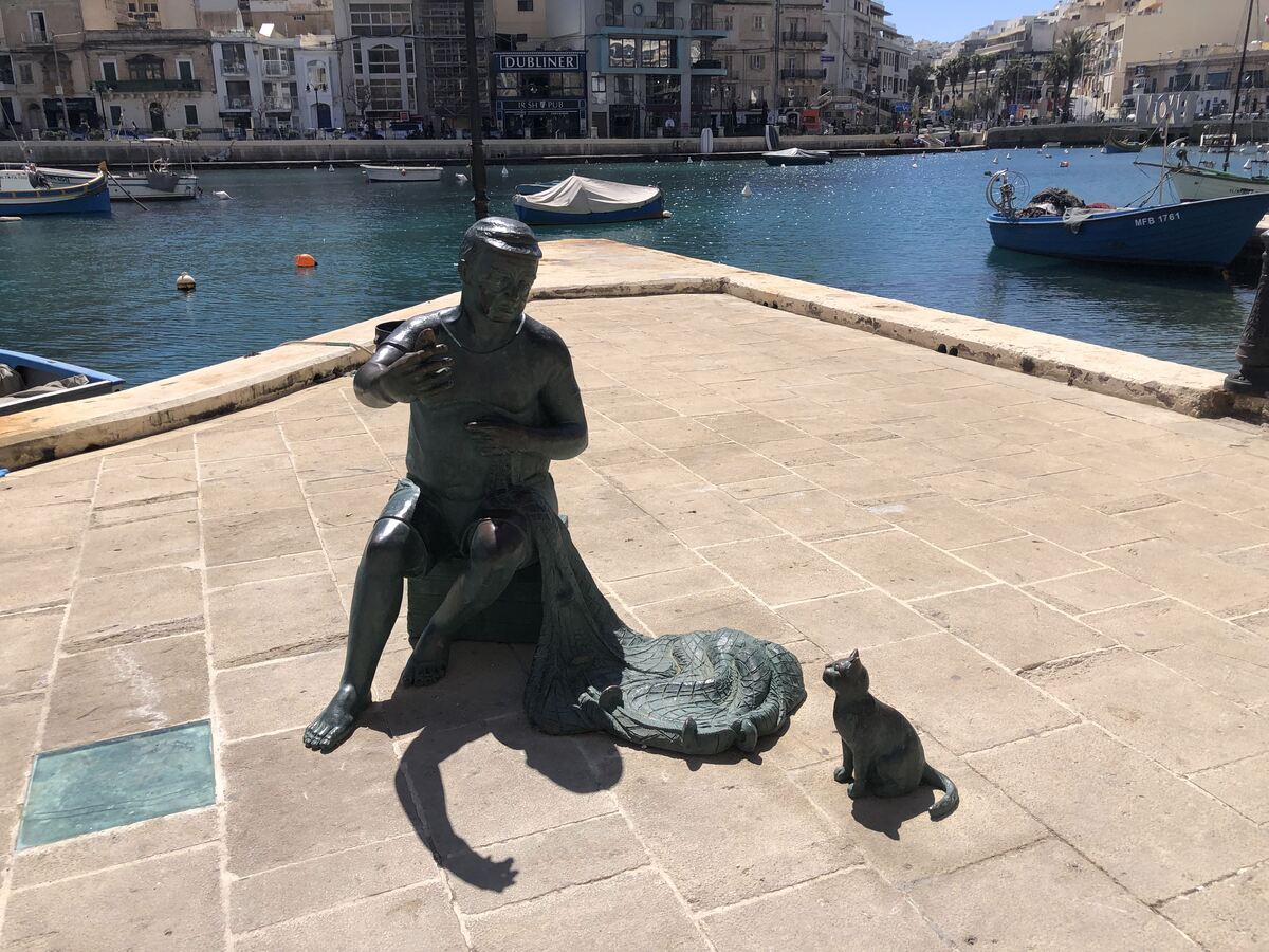 Sculpture of Fisherman and Cat